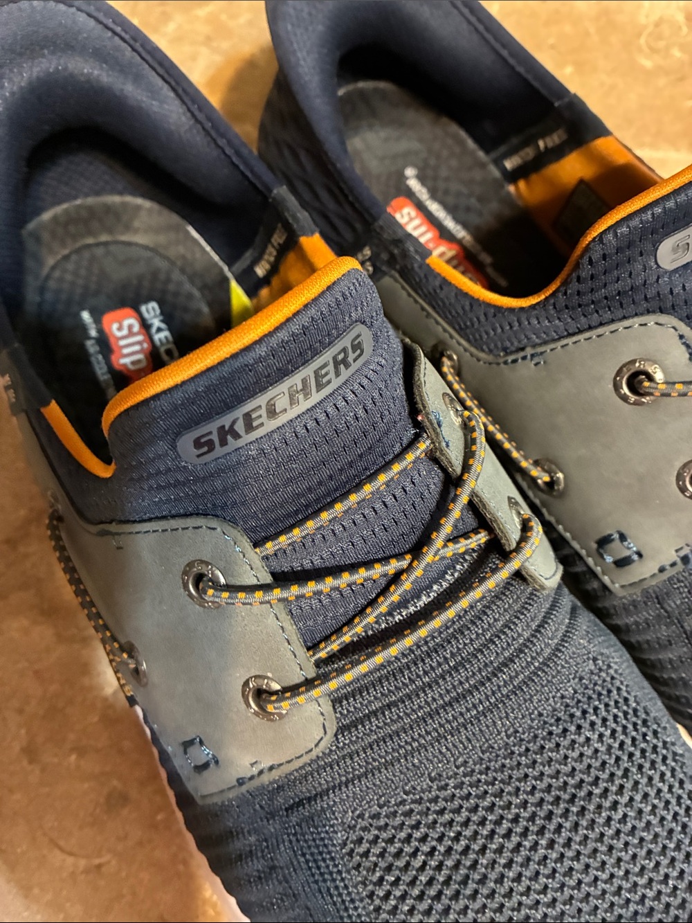 Skechers Men's Size 12 Navy Knit Slip-On Sneakers with Orange Liner - Picture 8 of 11